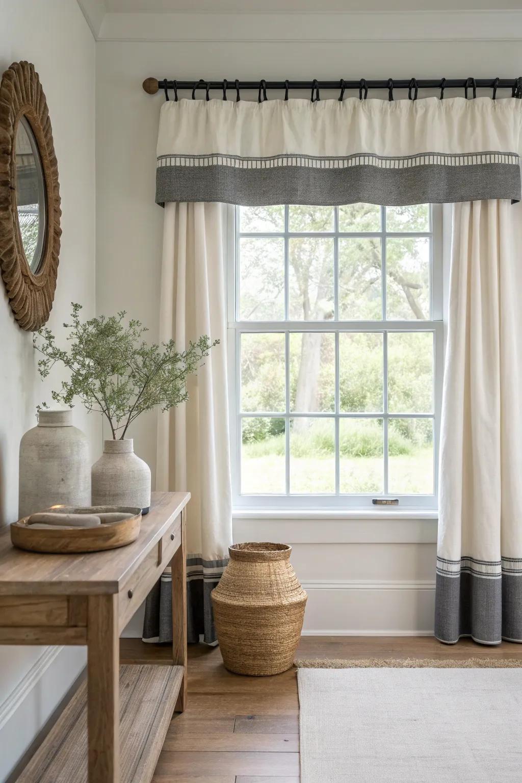 Contrasting borders on valances make windows pop, adding a modern touch to farmhouse decor.