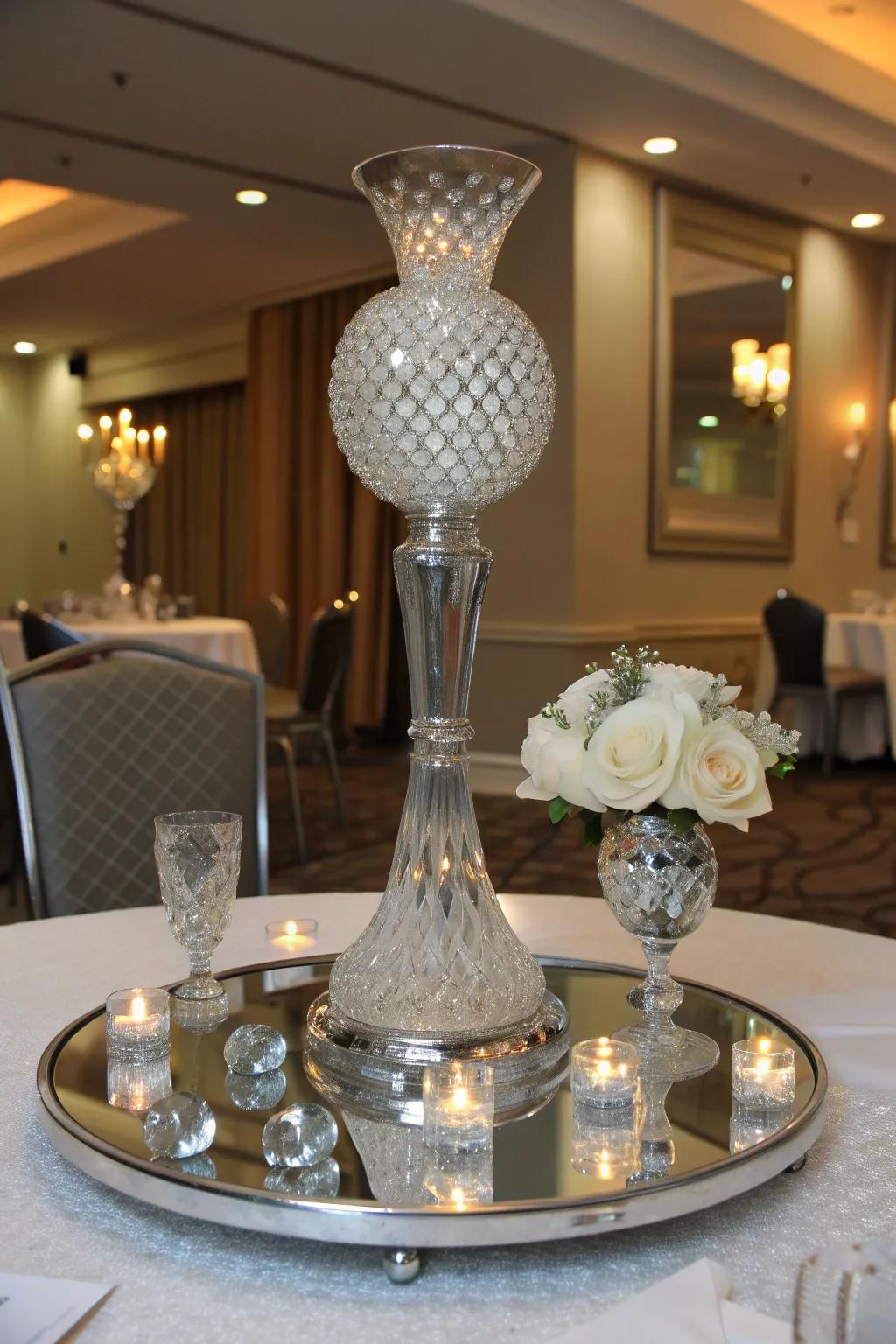 Glam up your table with a reflective centerpiece that dazzles with mirrored glass and crystal. #GlamDecor #CrystalClarity